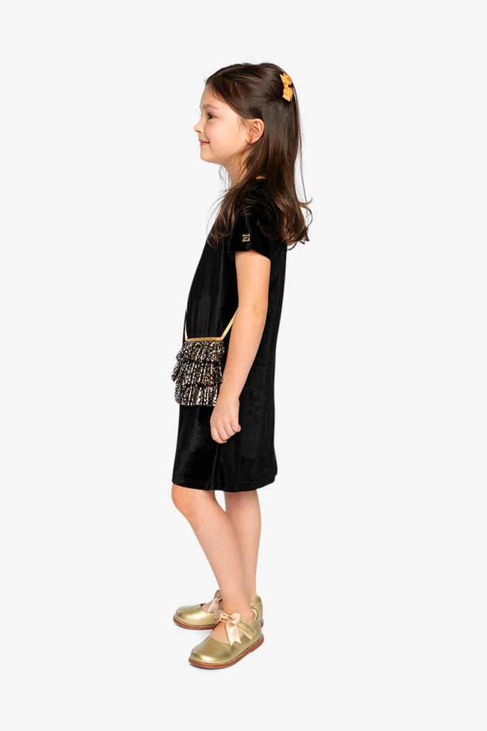 Lookbook view of a child in the Deux par Deux black and gold A-line party dress