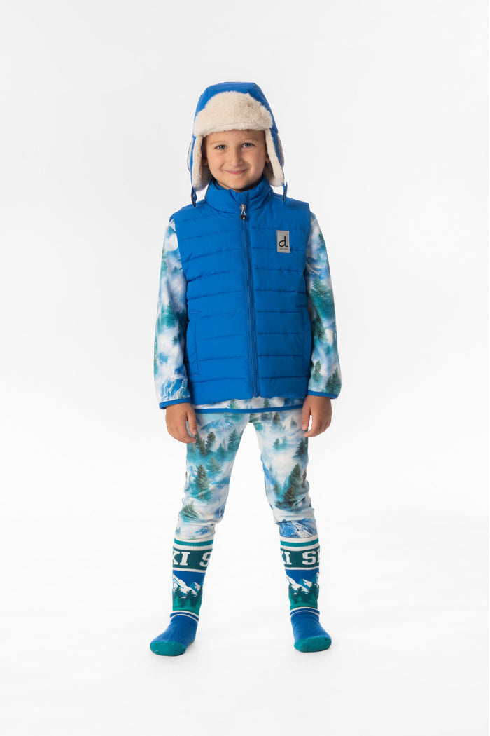 Child wearing the Deux par Deux blue quilted puffer vest, lookbook view