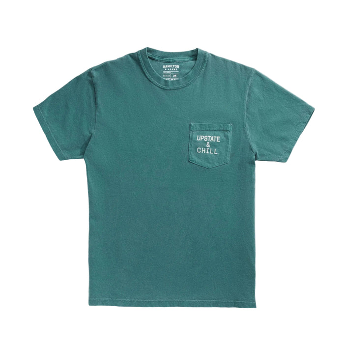Teal t-shirt with a pocket and text on a gray background