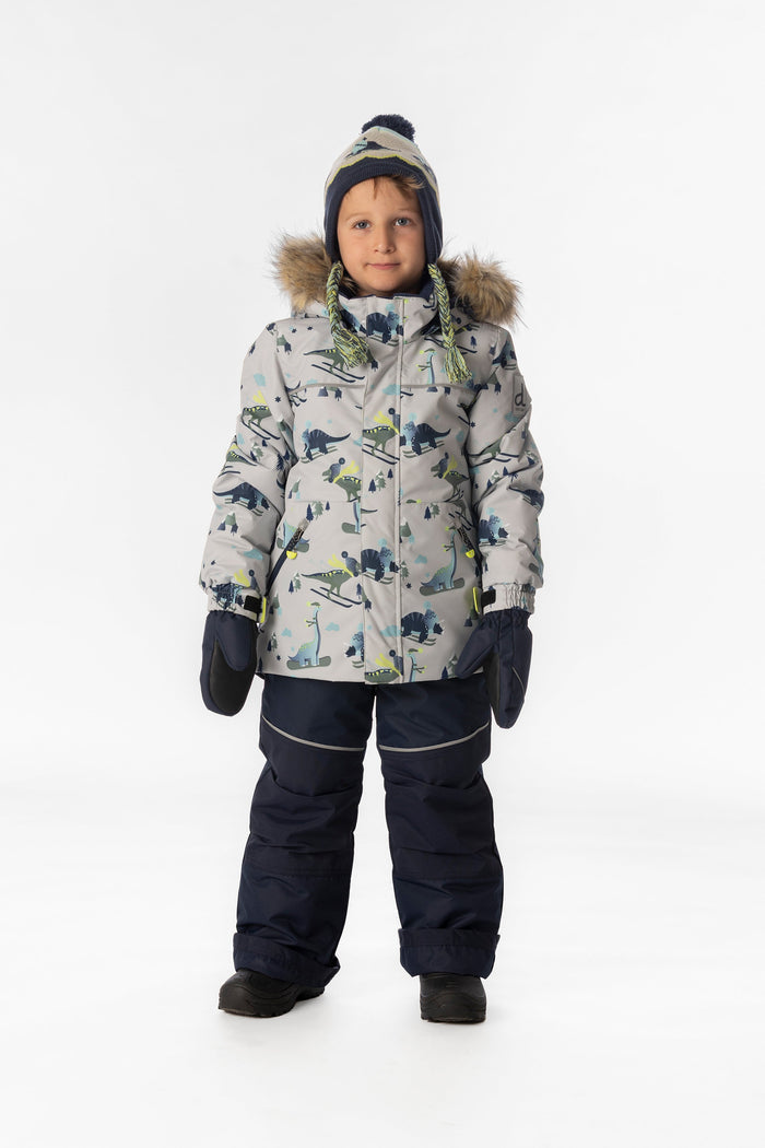 Child wearing the grey dinosaur print Deux par Deux DISCOVER snowsuit, full-length front view