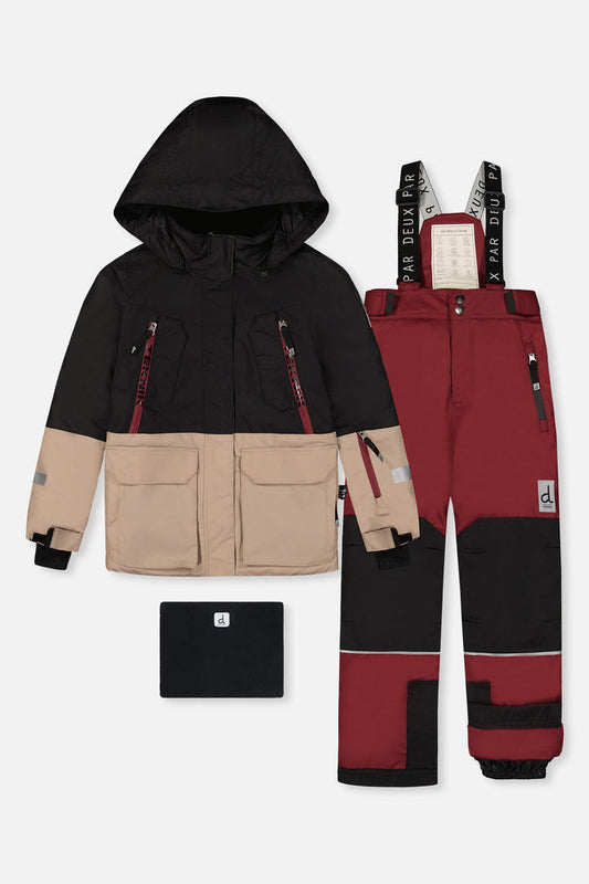 Deux par Deux TEKNIK two-piece snowsuit: black and beige jacket, burgundy snow pants and neck warmer, front view