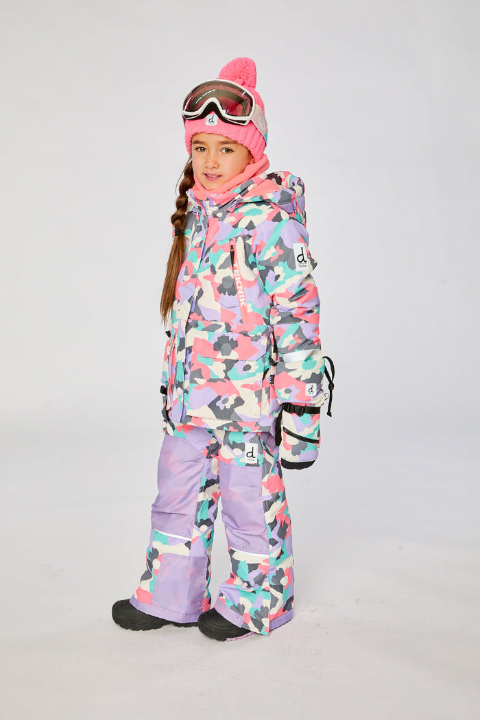 Deux par Deux girls' Teknik two-piece snowsuit in coral camouflage print with lilac panels – on a child model, side view
