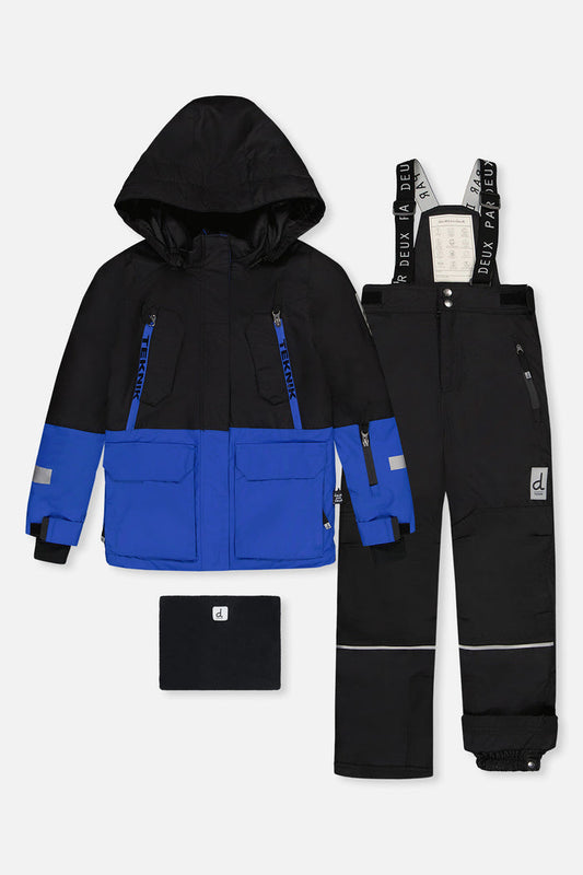 Deux par Deux TEKNIK two-piece snowsuit: black and royal blue jacket, black snow pants and neck warmer, front view
