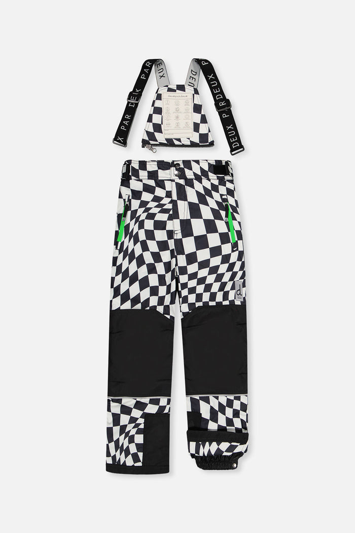 Checkered TEKNIK snow bib pants with black reinforced knees, front view