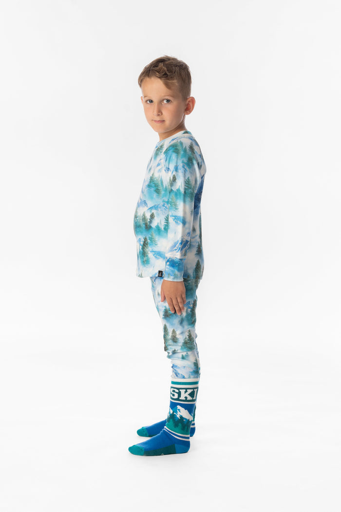Deux par Deux boys' thermal base layer set in blue mountain print – worn by a model, view 2