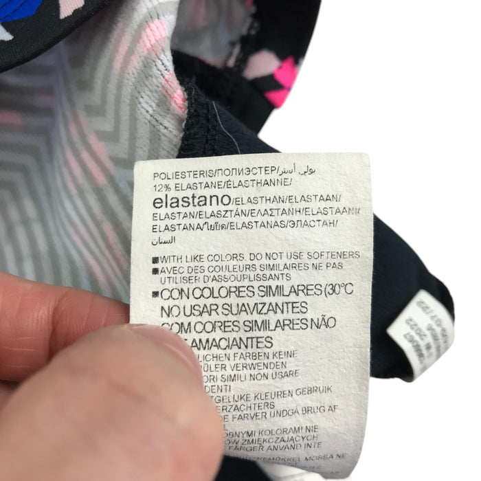 Under Armour 11-13 years black and pink patterned long sleeve thermal top