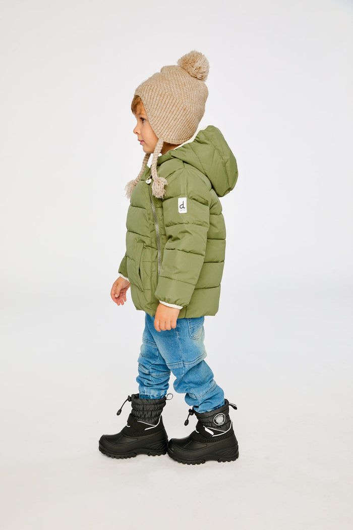 Child wearing the Deux par Deux olive green car seat winter jacket, side view
