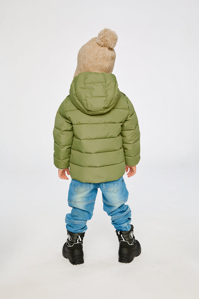 Child wearing the Deux par Deux olive green car seat winter jacket, back view