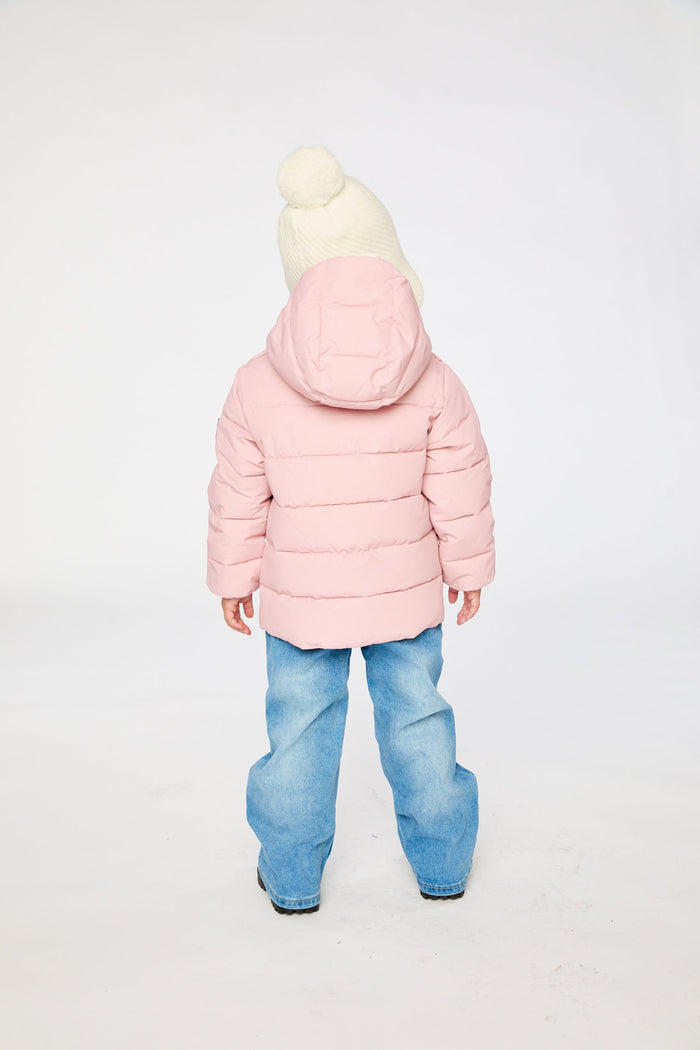 Child wearing the Deux par Deux pale dusty pink car seat winter jacket, back view