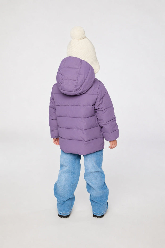 Child wearing the Deux par Deux violet car seat winter jacket, back view