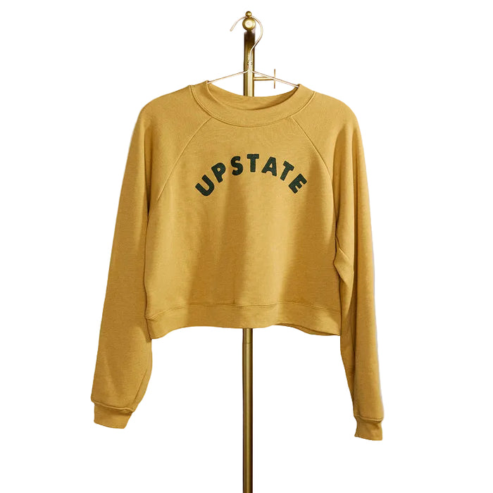 Mustard yellow sweatshirt with 'UPSTATE' text on a gray background