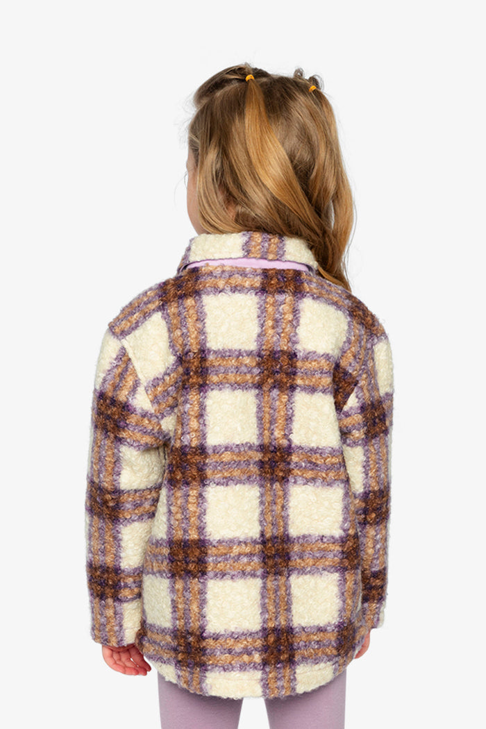 Child wearing the Deux par Deux sherpa overshirt in beige and mauve plaid, view 3